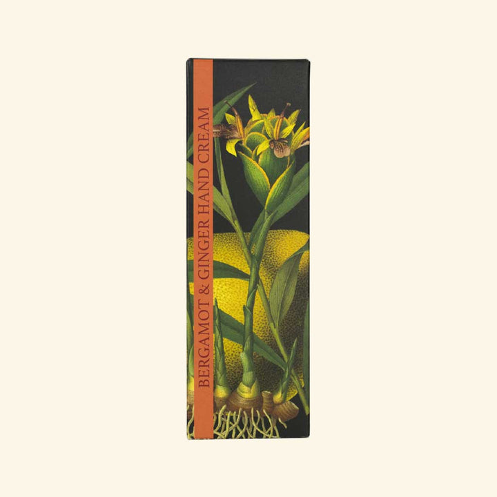 “Verpackung einer Handcreme mit Ingwer und Bergamotte, illustriert mit Pflanzenmotiv und botanischem Design.”