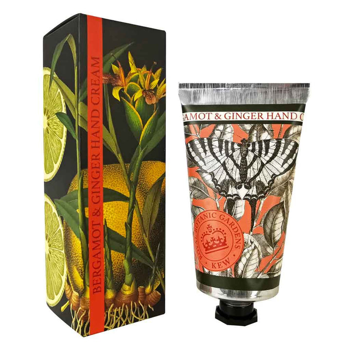 “Handcreme mit Bergamotte und Ingwer in dekorativer Tube, daneben passende Schachtel mit botanischem Design.”