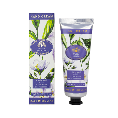 „Set aus Handcreme-Tube und Verpackung ‘White Jasmine’ mit floralem Design, violettem Deckel und Aufschrift ‘enriched with aloe vera and vitamin E’.“