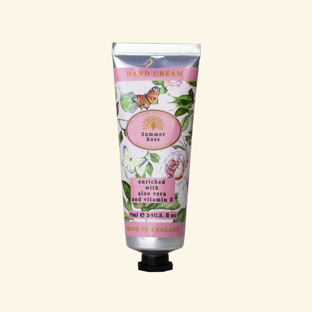 “Rosa Tube ‘Summer Rose’ Handcreme mit Rosendesign und Schmetterling, angereichert mit Aloe Vera und Vitamin E.”