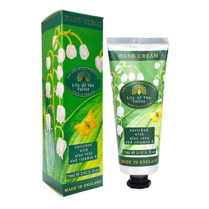 Grüne Handcreme Lily of the Valley mit passender Verpackung, verziert mit Maiglöckchen und goldenen Akzenten, klassisches Design aus England.