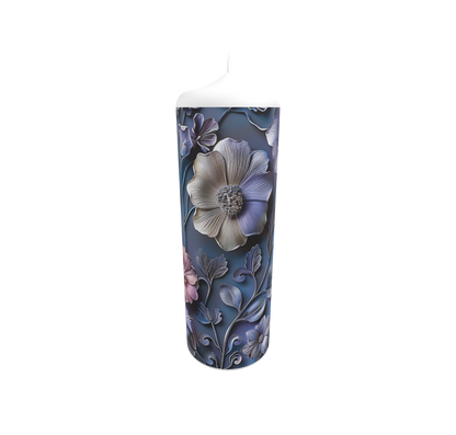 Künstlerkerze mit Blumenmuster in kräftigen Farben auf dunklem Hintergrund
